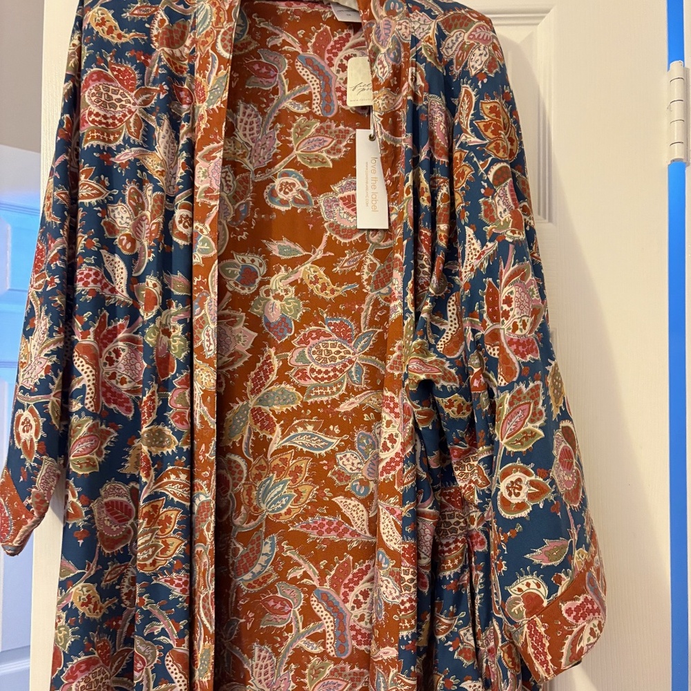 FREE PEOPLE KIMONO in rust and blues floral.
